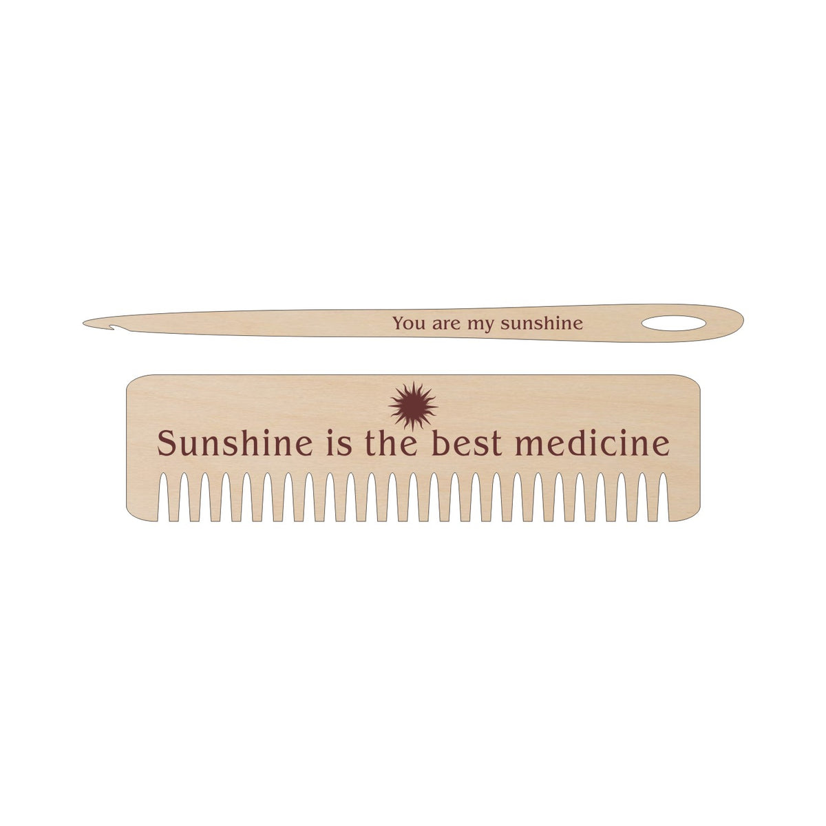 A wooden weaving comb and needle with the phrases 'You are my sunshine' and 'Sunshine is the best medicine' engraved on them.