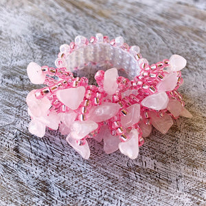 Pink seed bead band covered in rose quartz chips, made on the Beadalon Jewel Loom by Julianna C. Avelar