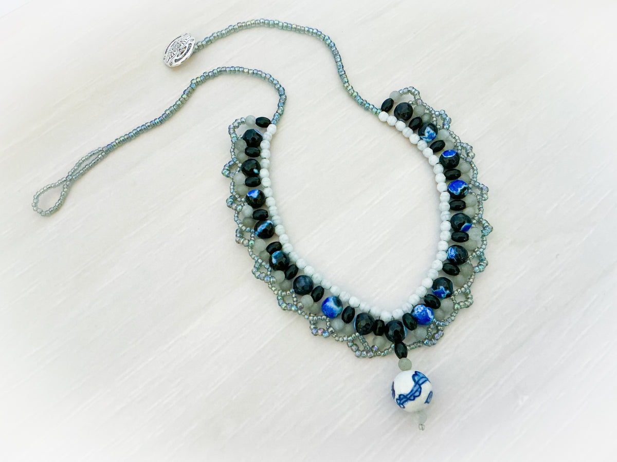 Blue White and Light Green beads from the May Jewel Box kit that make a Necklace with one blue and white porcelain bead 