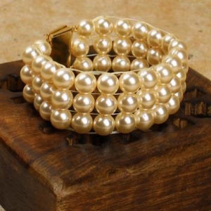 Multi-row cream glass pearl cuff bracelet with gold clasp, made on the Beadalon Jewel Loom by Julianna C. Avelar