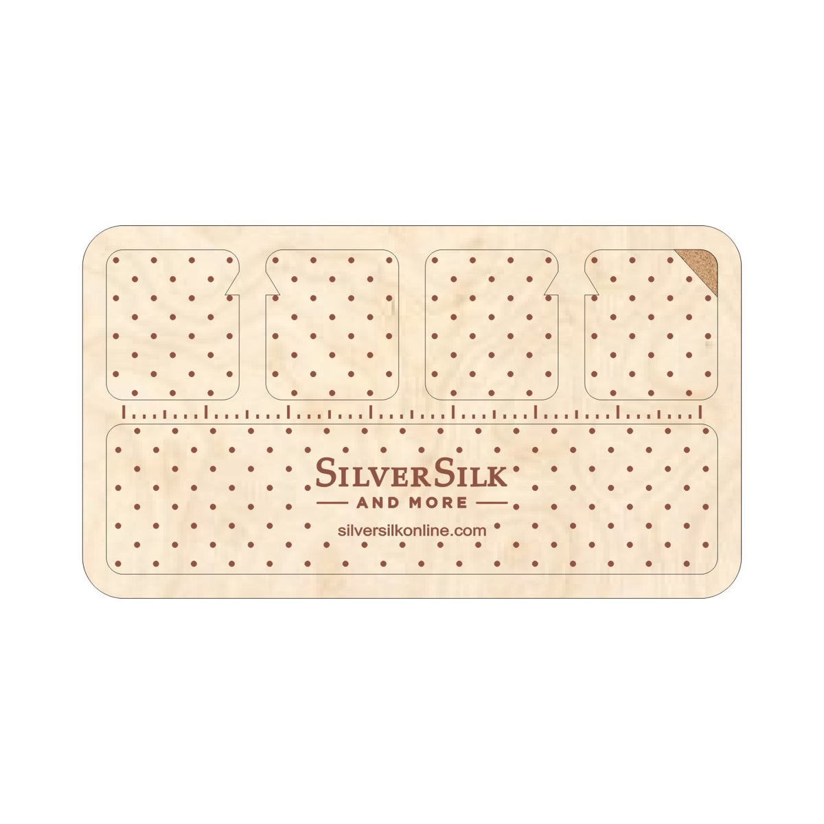 A beige wood bead board with ruler lines and small holes for beading, with the 'SilverSilk' brand logo visible.