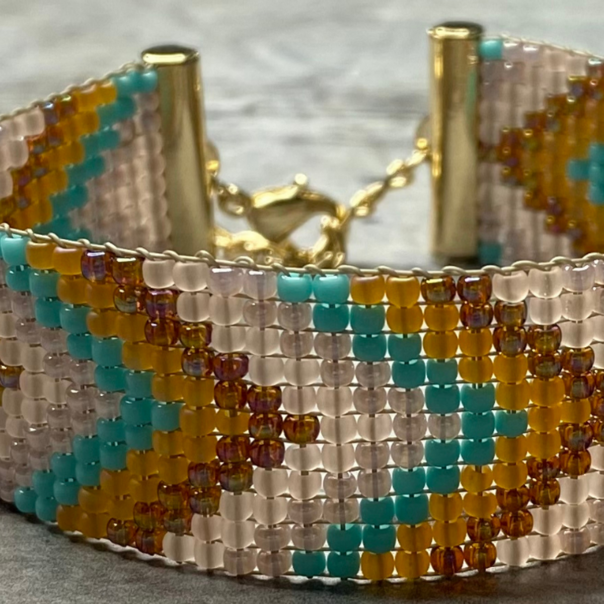 TOHO Seed Beads Round 11/0 Tube 2.5&quot; Transparent Frosted Rosaline